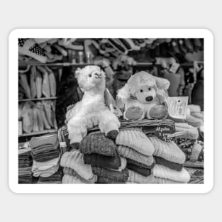 Market stall selling alpaca wool textiles Sticker